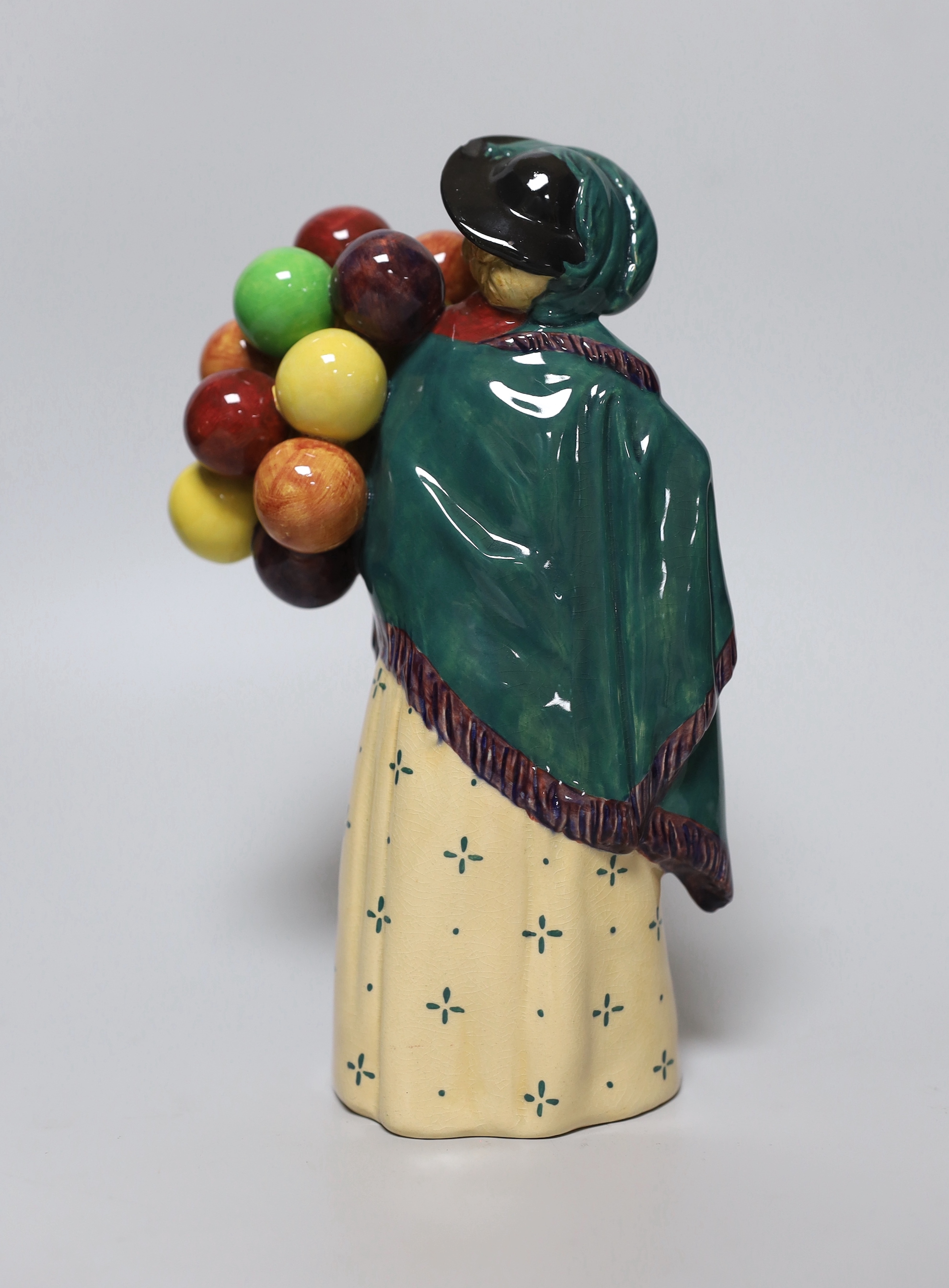 A Royal Doulton figure, 'The Balloon Seller', HN583